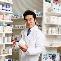 Pharmacist holding medication